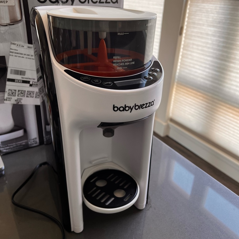 SOLD | Baby brezza. Like new. Washed and ready to use.
